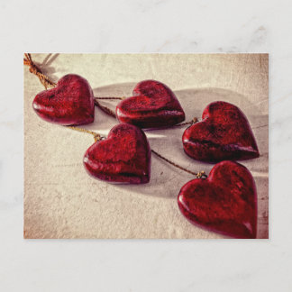 5 Red Wooden Hearts Entwined Together Postcard