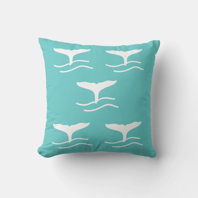 5 white whale tails on teal blue pillow (Front)
