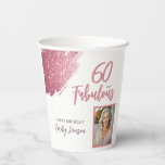 60 and Fabulous Pink Glitter Photo 60th Birthday Paper Cups<br><div class="desc">60 and Fabulous Pink Glitter Photo Surprise 60th Birthday Paper Cups. Stunning personalised cups with “60 and Fabulous” text and pink glitter design. Featuring sparkly faux-glitter brush strokes, and space for a personal photo, this elegant design is perfect for honouring a fabulous woman’s milestone birthday. Fully customisable to include a...</div>