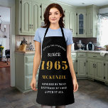 60th Birthday 1965 Name Chic Elegant Black Gold Apron<br><div class="desc">Elegant Black & Gold Chic Apron - 60th Birthday 1965 Name Personalised Kitchen & BBQ Essentials. Celebrate a fabulous birthday with style and practicality! This Elegant Black & Gold Chic Apron is the perfect accessory for the culinary enthusiast in your life. Its eye-catching design, enhanced with a touch of gold,...</div>