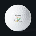 60th Birthday Golf Cheers and Beers Golf Balls<br><div class="desc">This is a cool and modern, 60th birthday, golf design. It is a simple, minimal design, in classic black and white, with pops of gold, orange and green. Perfect for a cool and fun, golf and beer themed, 60th birthday gift or party accessory and ideal as birthday keepsakes or party...</div>