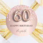 60th birthday rose gold pink drips  classic round sticker<br><div class="desc">Elegant, classic, glamourous and girly for a 60th birthday party. Rose gold and blush pink, gradient background. Decorated with rose gold, pink drips, paint dripping look. Personalise and add a name. With the text: Happy Birthday. The text is written with a modern dark rose coloured hand lettered style script. Number...</div>