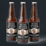 60th Birthday The Man The Myth The Legend Party Beer Bottle Label<br><div class="desc">The Man, The Myth, The Legend! Make any guy's 60th birthday "Extra" special with these personalised labels. The design features a faux-wood background with a black label inside that has a photo area for you to add your own photo of the birthday man. There is also an area of text...</div>