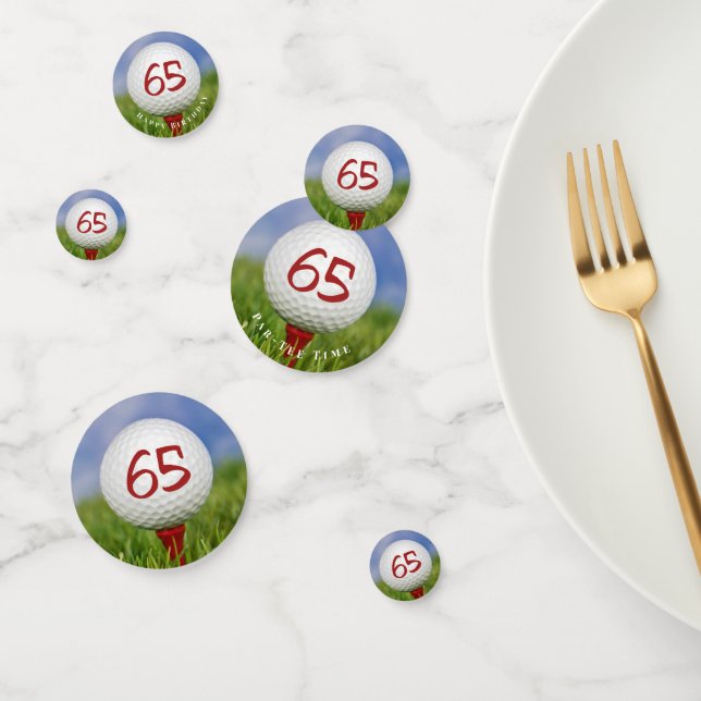 65th birthday golf ball on red tee confetti (Group)