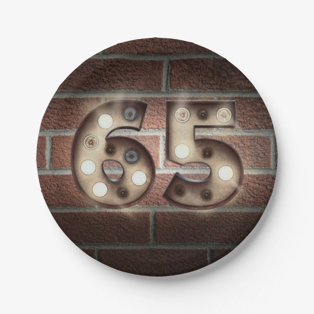 65th birthday marquee sign on brick wall paper plate (Front)