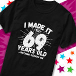 69 Year Old Sarcastic Meme Funny 69th Birthday T-Shirt<br><div class="desc">This funny 69th birthday design makes a great sarcastic humour joke or novelty gag gift for a 69 year old birthday theme or surprise 69th birthday party! Features 'I Made it to 69 Years Old... Nothing Scares Me' funny 69th birthday meme that will get lots of laughs from family, friends,...</div>