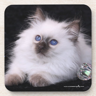 6 Balinese Hard Plastic coasters with cork back