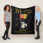 70th Birthday Champagne Black Fleece Blanket<br><div class="desc">A stylish 70th Happy birthday age blanket. Features a champagne bucket glasses and balloons and confetti all on a black background with gold coloured text. Perfect as a gift to celebrate a 70th birthday, something that they can cherish and snuggle up with, Can be customise by amending the titles and...</div>