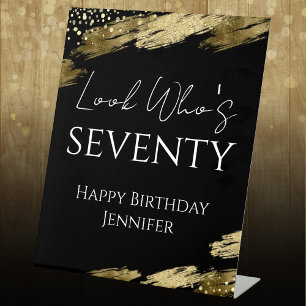 70th Birthday Look Who Gold Black Pedestal Sign