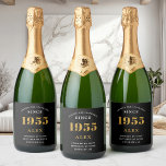 70th Birthday Name 1955 Black Gold Elegant Chic Sparkling Wine Label<br><div class="desc">Vintage Birthday Black & Gold Elegant Label. Celebrate your milestone with our exclusive sparkling wine birthday label. The meticulously designed label with stunning black and gold hues effortlessly enhances the visual appeal of your favourite sparkling wine. The year prominently featured on the label, adds a nostalgic throwback to the year...</div>