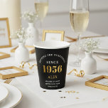 70th Birthday Name 1956 Black Gold Elegant Chic Paper Cups<br><div class="desc">Sophisticated 70th Birthday Unique Black & Gold Party Paper Cups. Celebrating a milestone birthday should be a memorable experience, and what better way to ensure that than with our sophisticated black and gold 70th Birthday Party Paper Cups? Designed in sleek black with an elegant gold highlight, these cups are printed...</div>