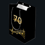 70th Birthday party black gold music notes name Medium Gift Bag<br><div class="desc">Chic black background with faux gold music notes for a 70th birthday. Templates for the age 70 and name.  The name is written in a hand-lettered style script.  Golden letters and number.</div>