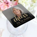 70th Birthday Party Photo Cheers Square Paper Coaster<br><div class="desc">This custom 70th birthday paper coaster features the guest of honour's personalised photo,  name,  and birthday,  along with the word "Cheers" in elegant gold-coloured calligraphy script. A dark screen helps make the text pop. A great way to celebrate someone who's turning seventy!</div>