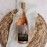 70th Birthday Party Photo Cheers Wine Label<br><div class="desc">This custom 70th birthday wine label features the guest of honour's personalised photo,  name,  and birthday,  along with the word "Cheers" in elegant gold-coloured calligraphy script. A dark screen helps make the text pop. A great way to celebrate someone who's turning seventy!</div>