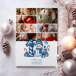 7 Photo Blue Snowman First Christmas Holiday Card<br><div class="desc">Celebrate your little one’s first holiday season with this cheerful winter design featuring a blue plaid number,  adorable snowman,  and scattered candy canes and gifts. Customise it with your baby's photo and birth details to create a keepsake that brings charm and magic to your holiday memories.</div>