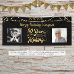 80th Birthday Black Gold String Lights Photos Banner<br><div class="desc">Celebrate an 80th birthday with this banner sign featuring a retro gold typography title design of 80 YEARS IN THE MAKING that incorporates his or her birth year as part of the design, 2 photos (fun to include Then and Now photos), gold string lights and your personalised custom message (the...</div>