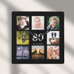 80th birthday custom photo collage family black square wall clock<br><div class="desc">A wall clock as a gift for a 80th birthday for a guy,  celebrating his life with a collage of 8 of your own photos.  Personalize and add age 80,  and a date.  Date of birth or the date of the anniversary.  White colored letters.  Black background.</div>