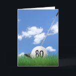 80th birthday golf ball in grass card<br><div class="desc">White golf ball in green grass with golf club and sky background for 80th birthday.
Age number on golf ball can be edited.</div>