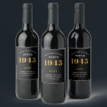 80th Birthday Name 1945 Black Gold Elegant Chic Wine Label<br><div class="desc">1945 Vintage 80th Birthday Black & Gold Elegant Wine Label. Celebrate your milestone with our exclusive birthday wine label. The meticulously designed label with stunning black and gold hues effortlessly enhances the visual appeal of your favourite wine. The year prominently featured on the label, adds a nostalgic throwback to the...</div>