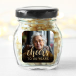80th Birthday Party Photo Cheers Square Sticker<br><div class="desc">This custom 80th birthday sticker features the guest of honour's personalised photo and birthday,  along with the word "Cheers" in elegant gold-coloured calligraphy script. A dark screen helps make the text pop. A great way to celebrate someone who's turning eighty!</div>