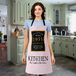 90th Birthday 1935 Name Elegant Black Gold Pink Apron<br><div class="desc">A wonderful birthday black and gold design on an apron for that special celebration. Easily customise the text using the template provided. Part of the setting standards range of birthday supplies.</div>