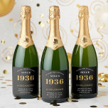 90th Birthday Name 1936 Black Gold Elegant Chic Sparkling Wine Label<br><div class="desc">1936 Vintage 90th Birthday Black & Gold Elegant Sparkling Wine Label. Celebrate your milestone with our exclusive 1936 Vintage 90th birthday wine label. The meticulously designed label with stunning black and gold hues effortlessly enhances the visual appeal of your favourite wine. The year 1936, prominently featured on the label, adds...</div>
