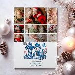 9 Photo Blue Snowman First Christmas Holiday Card<br><div class="desc">Celebrate your little one’s first holiday season with this cheerful winter design featuring a blue plaid number,  adorable snowman,  and scattered candy canes and gifts. Customise it with your baby's photo and birth details to create a keepsake that brings charm and magic to your holiday memories.</div>