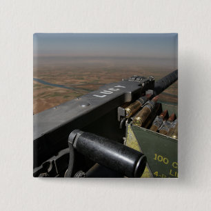 A 50 calibre machine gun 15 cm square badge