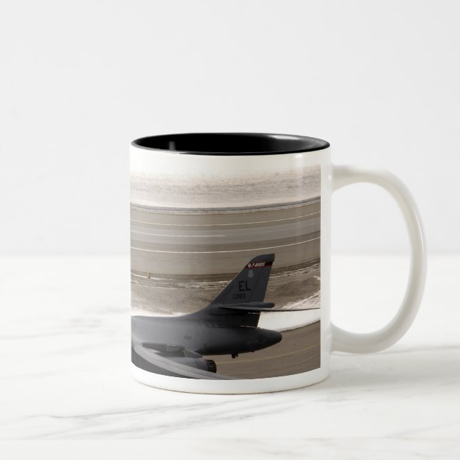 A B-1B Lancer performs a touch and go Two-Tone Coffee Mug (Right)