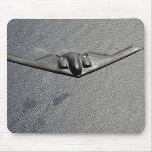 A B-2 Spirit flies over the Pacific Ocean Mouse Pad