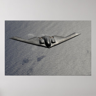A B-2 Spirit flies over the Pacific Ocean Poster