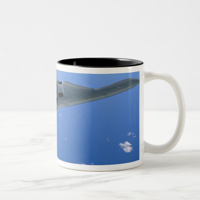A B-2 Spirit soars through the sky Two-Tone Coffee Mug (Right)
