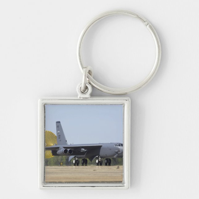 A B-52 Stratofortress deploys its drag chute Key Ring (Front)