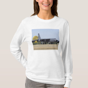 A B-52 Stratofortress deploys its drag chute T-Shirt