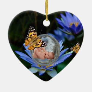 A baby bundle of joy christmas ceramic ornament