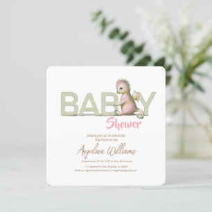 A baby shower invitation with an adorable dragon.