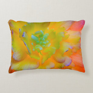 A back-lit, glowing begonia blossom decorative cushion