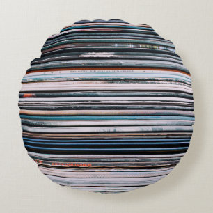 A background consisting of a stack of records in t round cushion