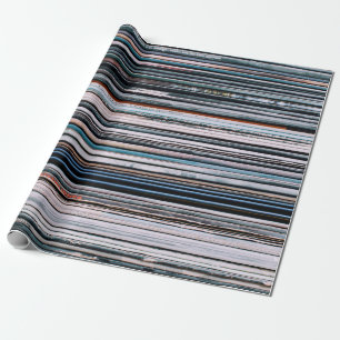 A background consisting of a stack of records in t wrapping paper
