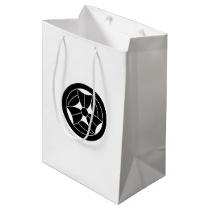 a bamboo leaf that is broken three times in a circ medium gift bag
