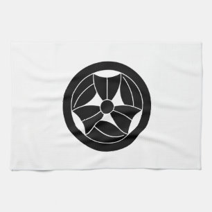 a bamboo leaf that is broken three times in a circ tea towel