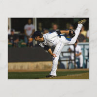 A baseball playing throwing the ball