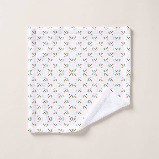 A bathroom towel set displayed against a light wal (Wash Cloth)