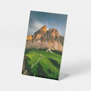 A beautiful landscape full of colors pedestal sign
