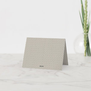 a beige background with a pattern of small squares thank you card
