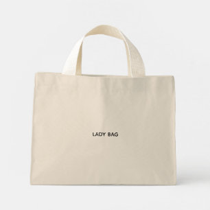 A beige tote bag with white handles 