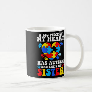A Big Piece Of My Heart Has Autism And She's My Si Coffee Mug