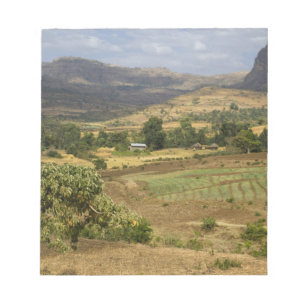 A big scenic view of a big rock mountain notepad