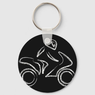 A biker on a motorbike key ring