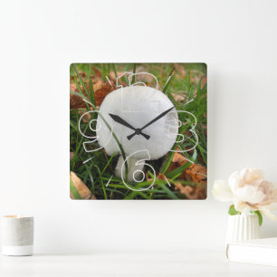 A bitten mushroom square wall clock